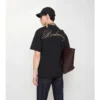 Baumwoll-T-Shirt mit kursivem Logo im Karomuster