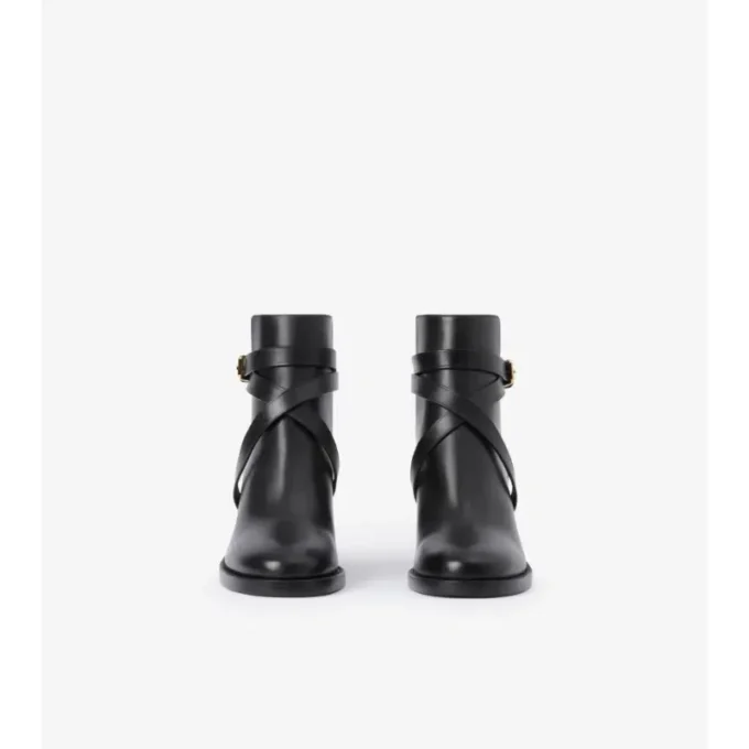 Stiefel mit Karomuster und Lederabsatz